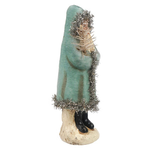Teal soft blue velvet belsnickle figurine wearing hooded coat with silver tinsel trim holding a bundle of straw