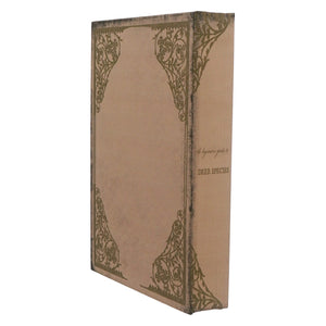 A vintage-style beige deer species journal with intricate dark brown floral patterns from ragon house