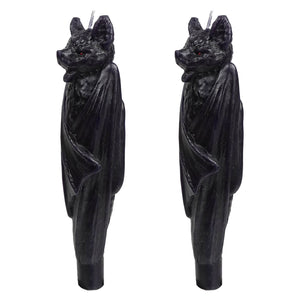 8 inch black bat taper candles set of 2 with detailed wings and red eyes made from wax perfect halloween candles