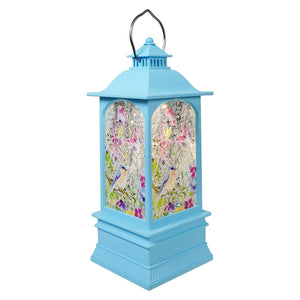 8 inch led lighted blue bird and butterfly pastel blue spinning water globe lantern perfect for easter lighted decor