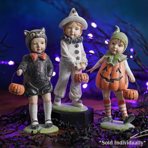 Three halloween figurines featuring a resin black cat costume trick or treater holding jack o lantern baskets by regency international halloween