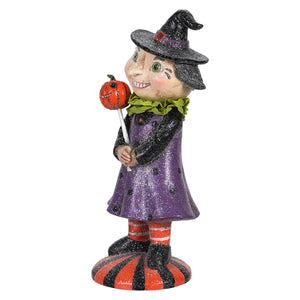 8 inch resin retro witch figurine in purple dress with pointed black hat holding a pumpkin lollipop on striped base