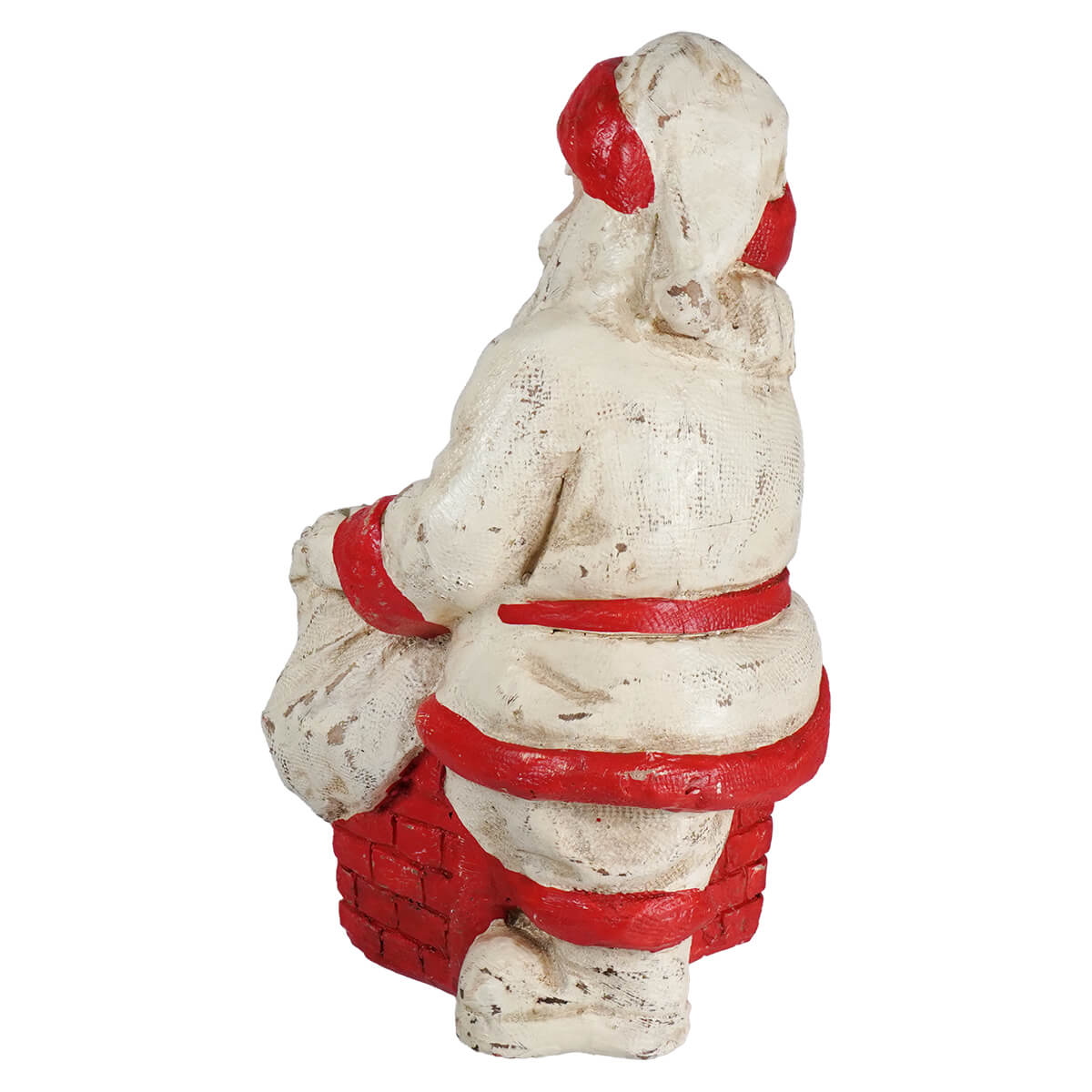 White and red painted resin santa figure sitting on a brick chimney perfect for folk art santas and ragon house design