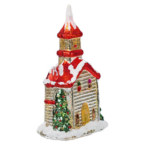 9.5 inch lighted vintage church ornament by raz imports with red gold colors snow dusted roof and green tree vintage reproduction christmas village houses