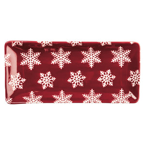 Glossy red rectangular snowflake platter with white snowflake pattern perfect for holiday serving and decor