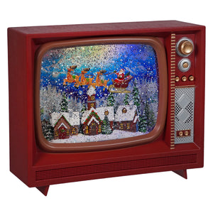Red vintage tv-shaped town musical lighted christmas decor with santa flying over snowy houses and holiday lights
