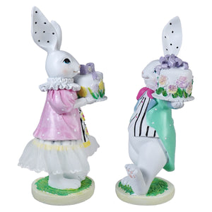 Two 9 inch porcelain easter bunnies in pink and mint holding decorated cakes perfect easter figures set