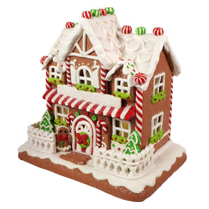 9 inch led lighted two floor gingerbread junction house with red candy canes green icing trees and peppermint decor