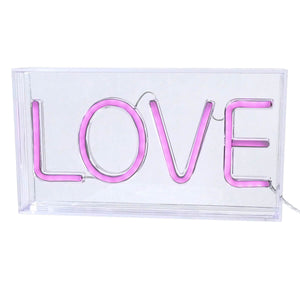 Pink neon-style ’LOVE’ text in a clear acrylic box.