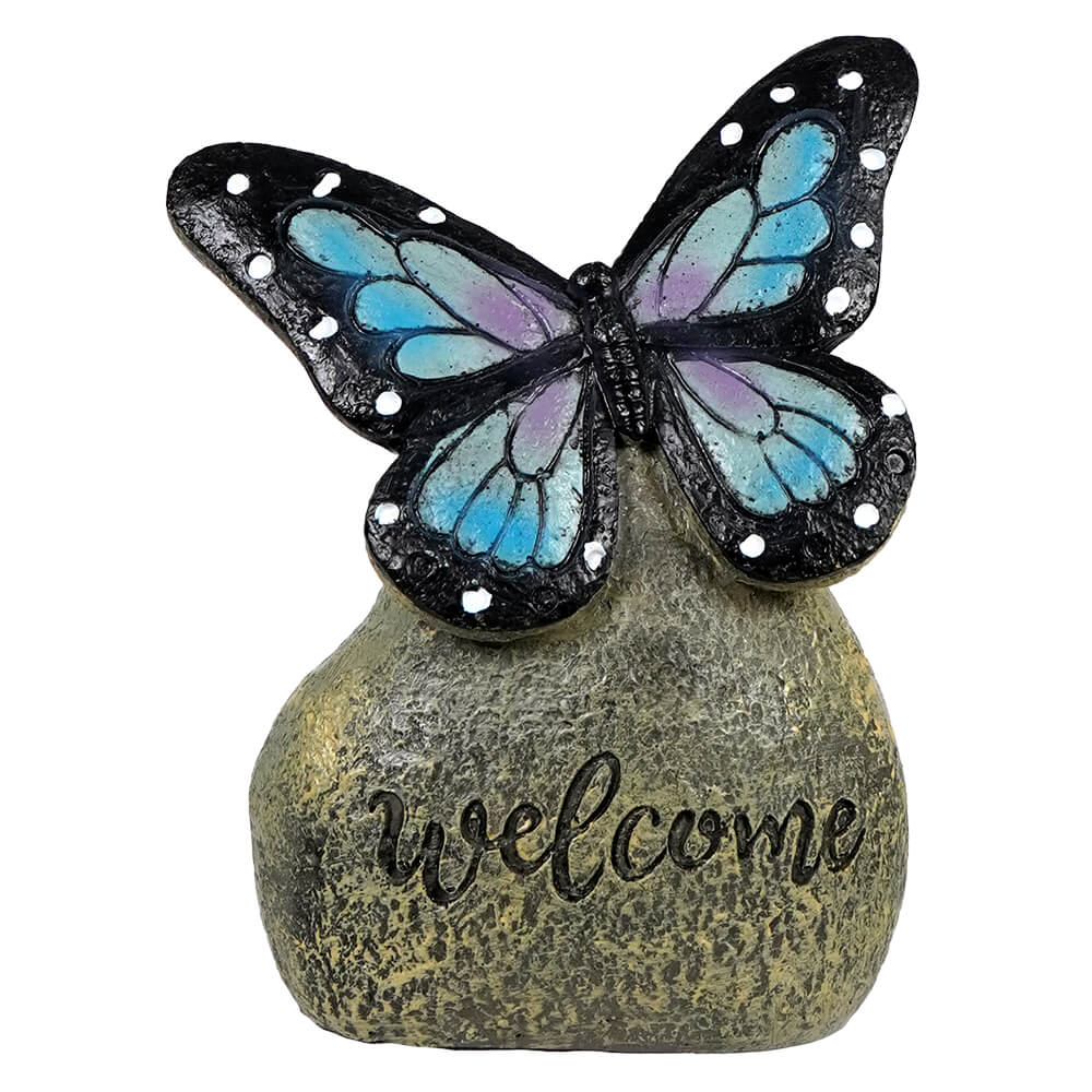 Blue Butterfly On "Welcome" Stone