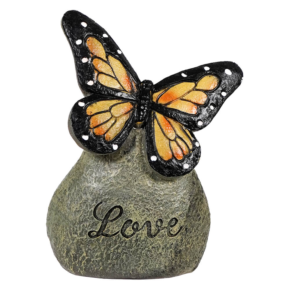 Yellow Butterfly On "Love" Stone
