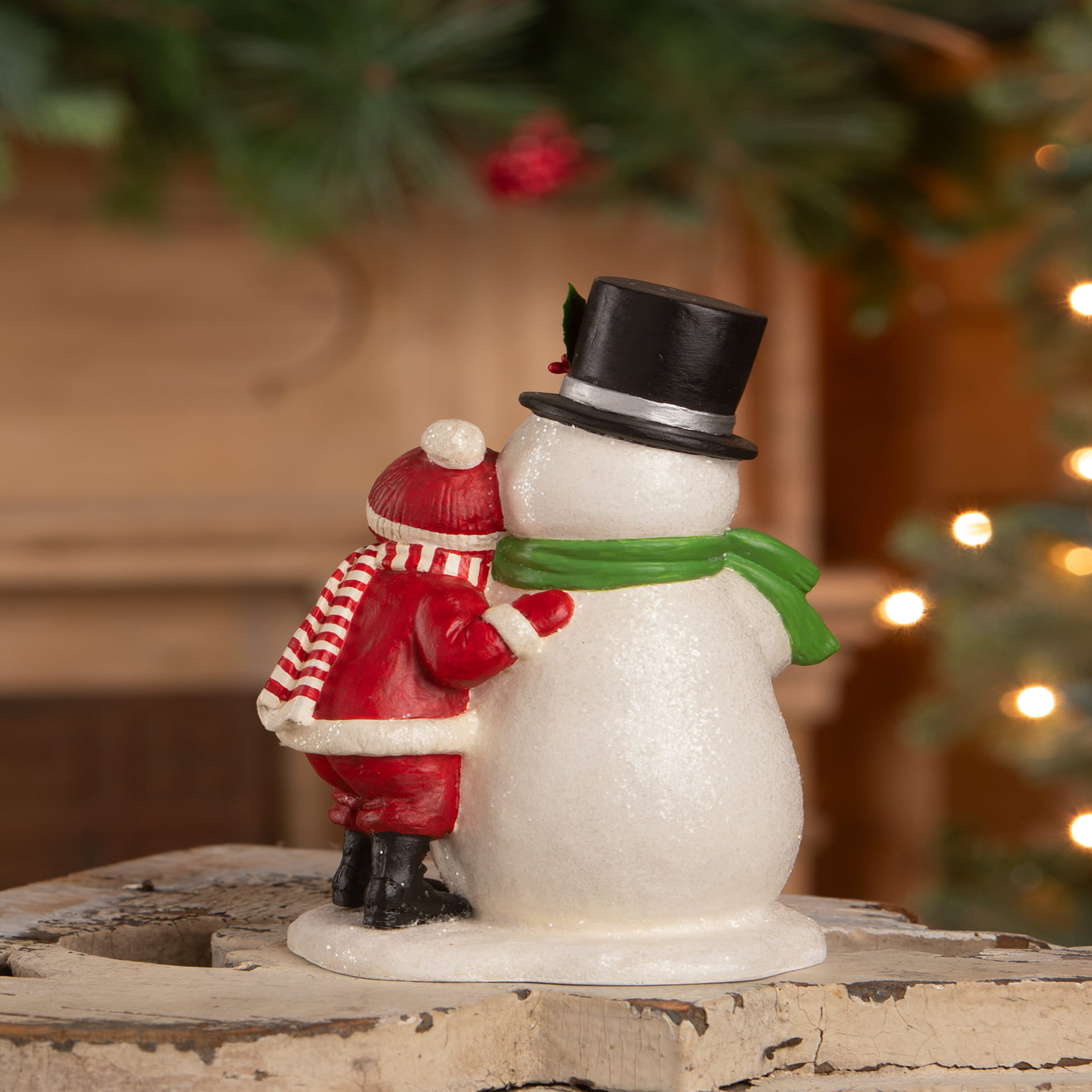 Child Hugging Snowman