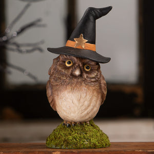 A charming brown and cream owl figurine in a black witch hat with an orange band by bethany lowe design perfect for halloween witches decor