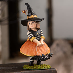 Emery halloween witch figurine with black hat and orange spider standing on green mossy base for witch decor