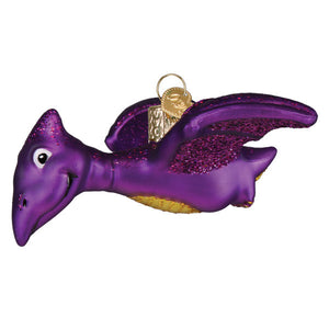 Purple glitter pterodactyl glass ornament with gold accents and hanging loop perfect for figural decor or lighted decor