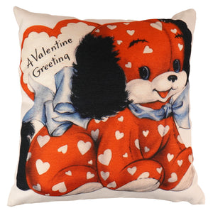 Adorable valentine dog pillow with orange and white heart pattern and cartoon black dog with blue bow tie