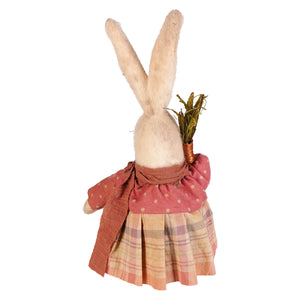 A cream alice rabbit plush figurine in pink holding carrot dressed in plaid skirt by muffin junction design