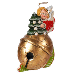 A festive golden bell ornament by vaillancourt folk art featuring a painted angel with blonde hair and red wings holding a tiny tree