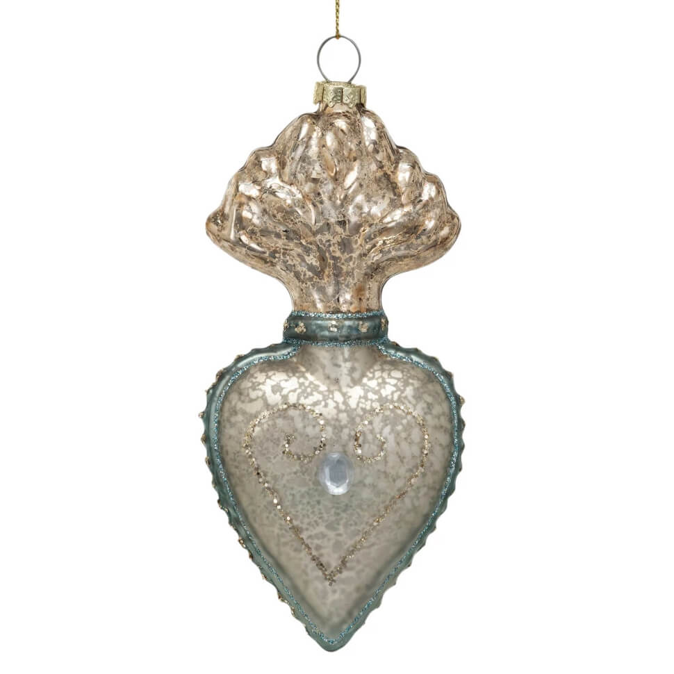 Ornate heart-shaped glass Christmas ornament with a decorative top.