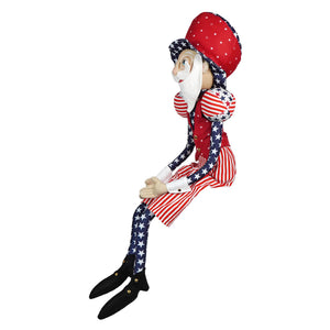 A plush attitus star uncle sam figurine with a red white and blue star hat striped suit perfect for patriotic figures display