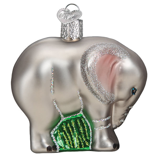 Silver glass baby elephant ornament with glittery pink ears and green belly detail perfect for figural decor
