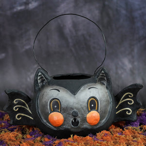 Black and gray vintage-style batty barnum bucket halloween bucket with orange pom-poms gold-trimmed eyes and wire handle