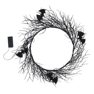 Black halloween batty lighted wreath made of twisted branches with bat cutouts perfect for spring hanging decor