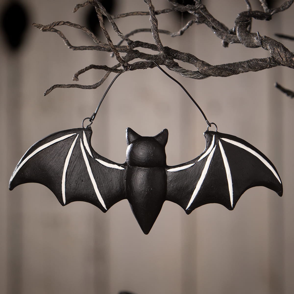 Black batty skeleton ornament with white wing stripes hanging halloween ornament by bethany lowe
