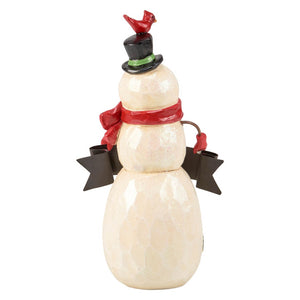 Cream-colored jolly snowman figurine with black top hat red scarf and cardinal perfect for christmas snowman figures and decor