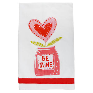 Red jar with ’BE MINE’ text and a heart growing from it like a flower.