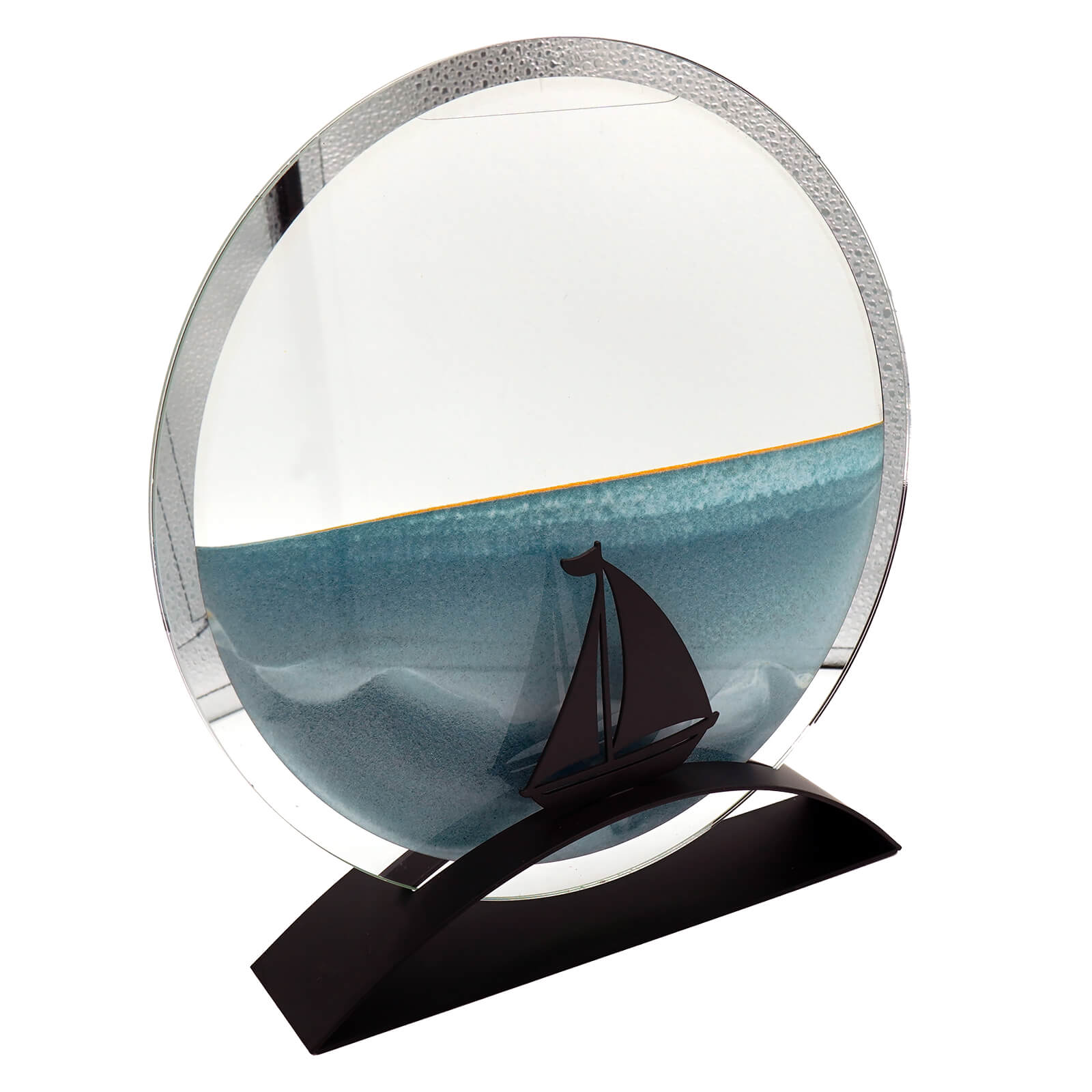 Beachcombers 10.5 inch round glass sand art with dark sailboat silhouette and ocean-blue flowing sand in silver rim, figural decor