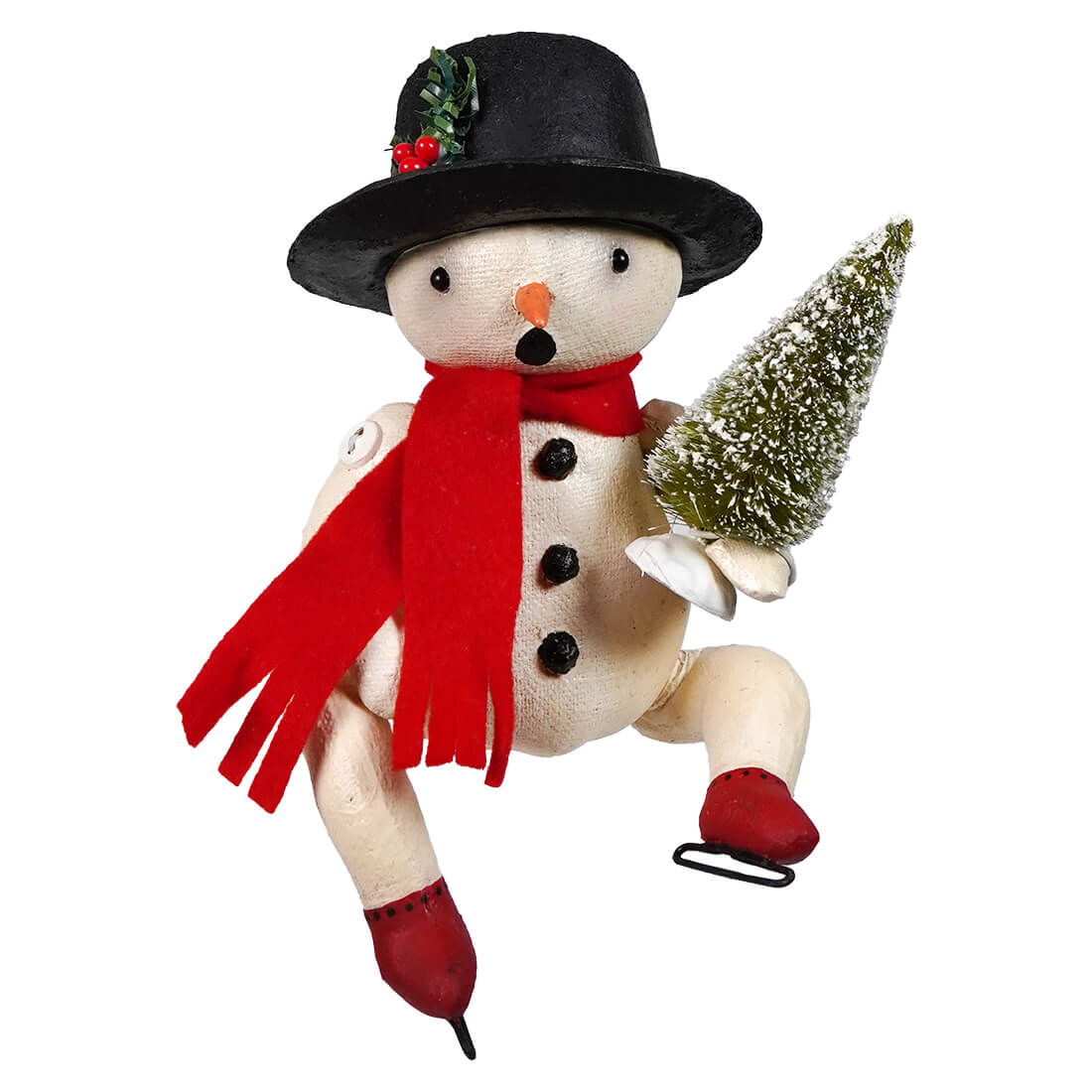 A cream-colored bing snowman figurine by bethany lowe designs wearing a black top hat and red scarf holding a frosted tree