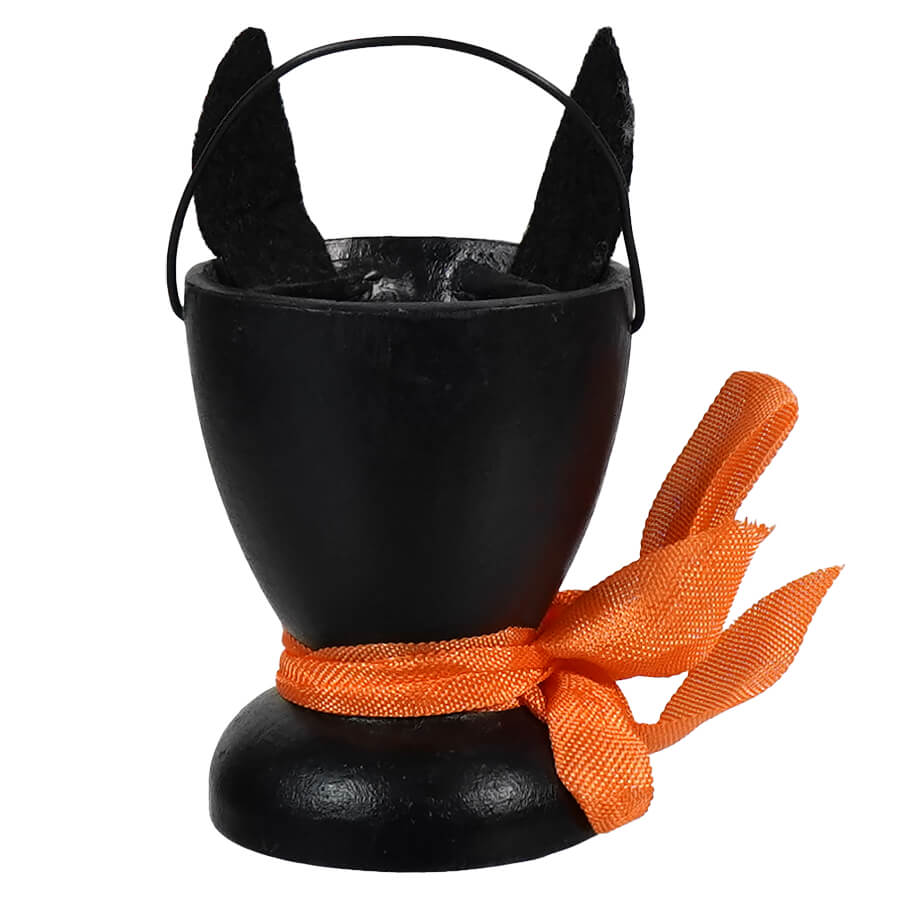 Black cat-shaped candy bucket with pointed ears and an orange ribbon bow.