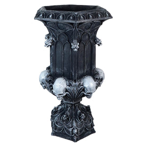 Gothic-style decorative urn with skull motifs and intricate architectural details.