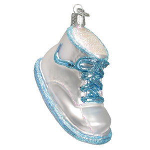 Shiny silver baby shoe ornament with blue glitter laces and trim perfect figural decor for baby shoe ornament lovers