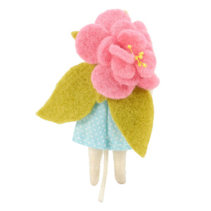 A charming felt mouse critter in a light blue polka-dot skirt with a pink flower and green leaves for easter spring decor