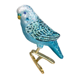 A sparkling blue parakeet glass ornament with glittery feathers and a gold clip for animal ornaments collection