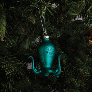 Teal glass baby octopus ornament with silver metal hanger perfect for sea and beach themed ornaments collection