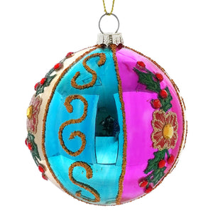 A vibrant ball witch eye ornament with purple floral design featuring turquoise and magenta sections with gold swirls