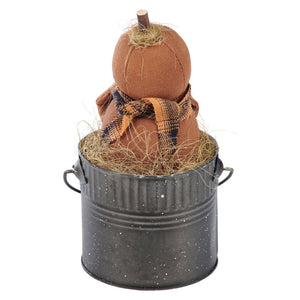 Brown fabric boo doll pumpkin with plaid scarf and straw stem in black metal bucket perfect for halloween dolls display