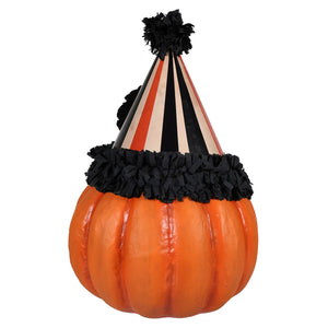 A vibrant orange boo party pumpkin wearing a black and cream striped party hat with fringed trim for halloween pumpkins