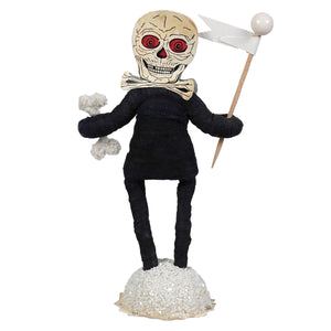 Boo skeleton figure with red glowing eyes black fabric body and bone accents holding white flag on glittery coffin base