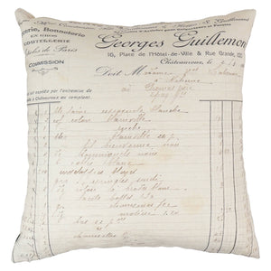 Cream-colored vintage garden pillow with botanical floral vintage design and elegant black cursive script writing