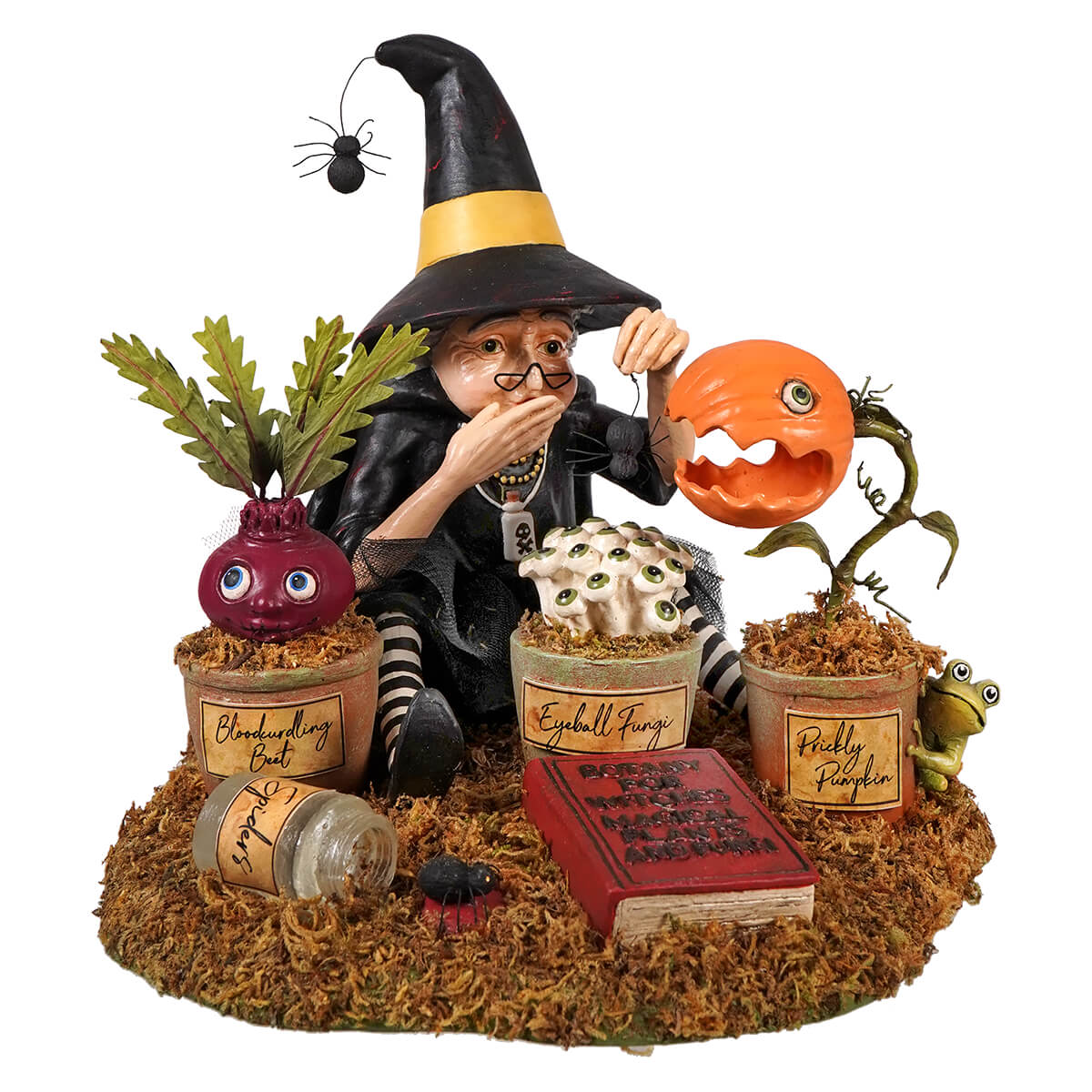 Botany witch figurine in whimsical halloween witches style with green hat and detailed botanical outfit