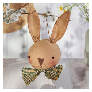 A rustic tan fabric bow tie bunny ornament with a green checkered bow tie from kathy easter design easter ornaments