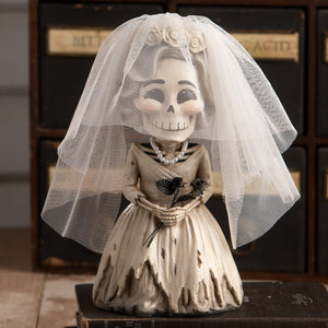 Whimsical bride evangeline skelly skeleton decor figure in cream lace wedding gown with delicate white veil