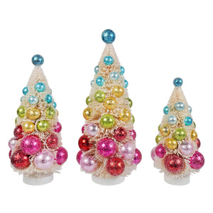 Three miniature frosted bottle brush christmas trees with colorful glittery ornaments from bright hues polka dot trees set