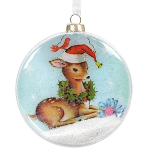 Christmas tree ornament featuring a festive deer wearing a Santa hat and holly wreath.
