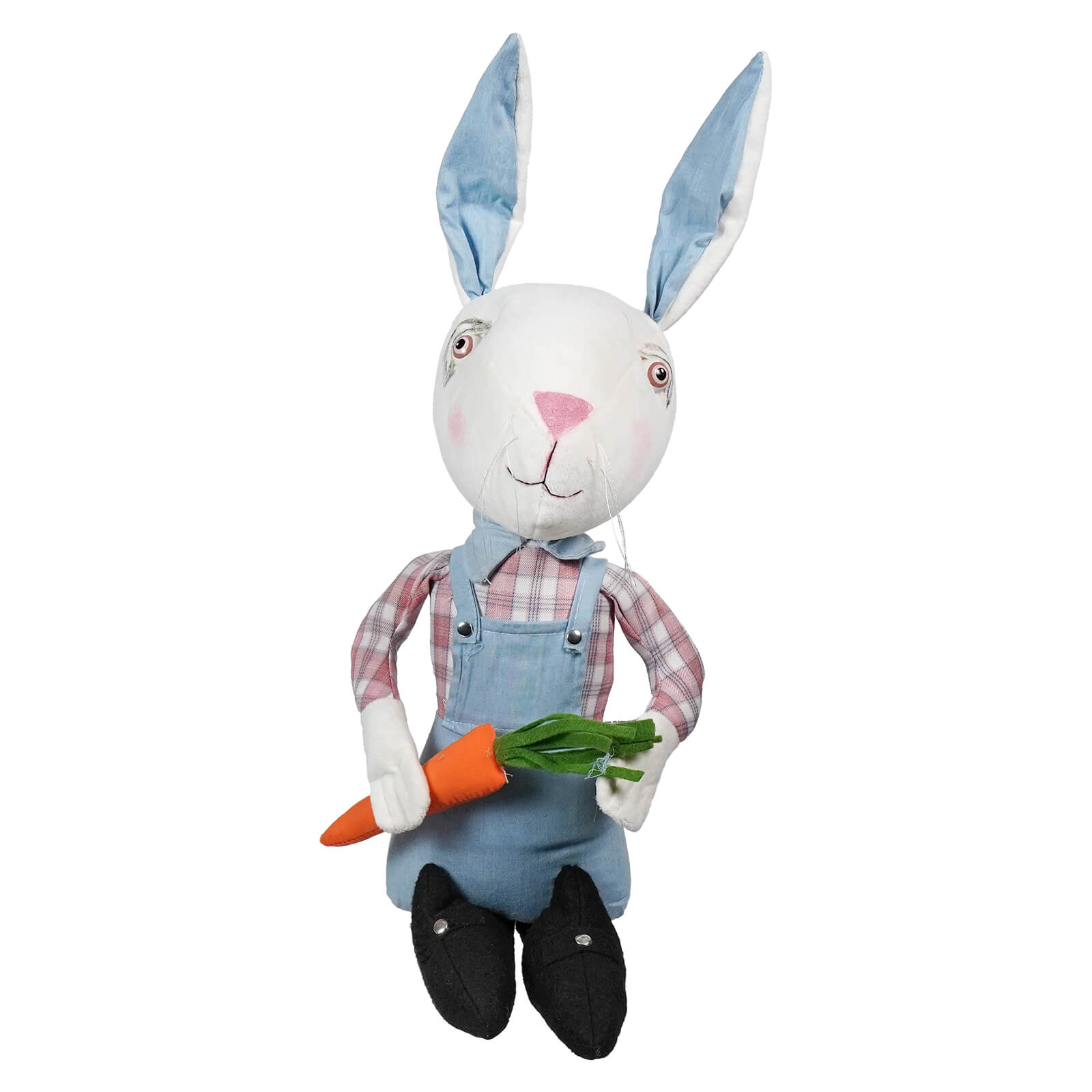 A plush white brixton bunny by joe spencer wearing denim overalls holding a carrot from spring and easter figures