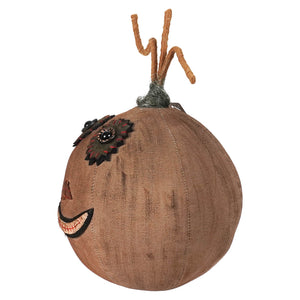 Brown canvas rustic pumpkin with stitched face black button eye red stitching dark floral appliqué and orange stem